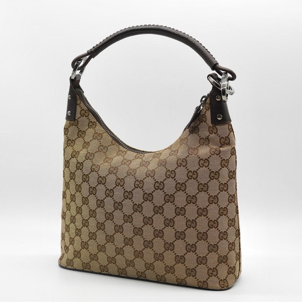 This is a vintage Gucci and is in great condition !